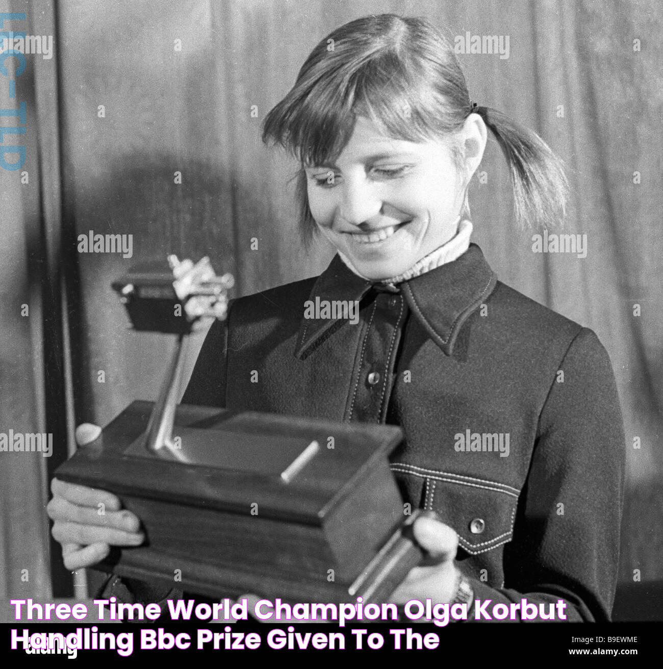 Three time world champion Olga Korbut handling BBC prize given to the