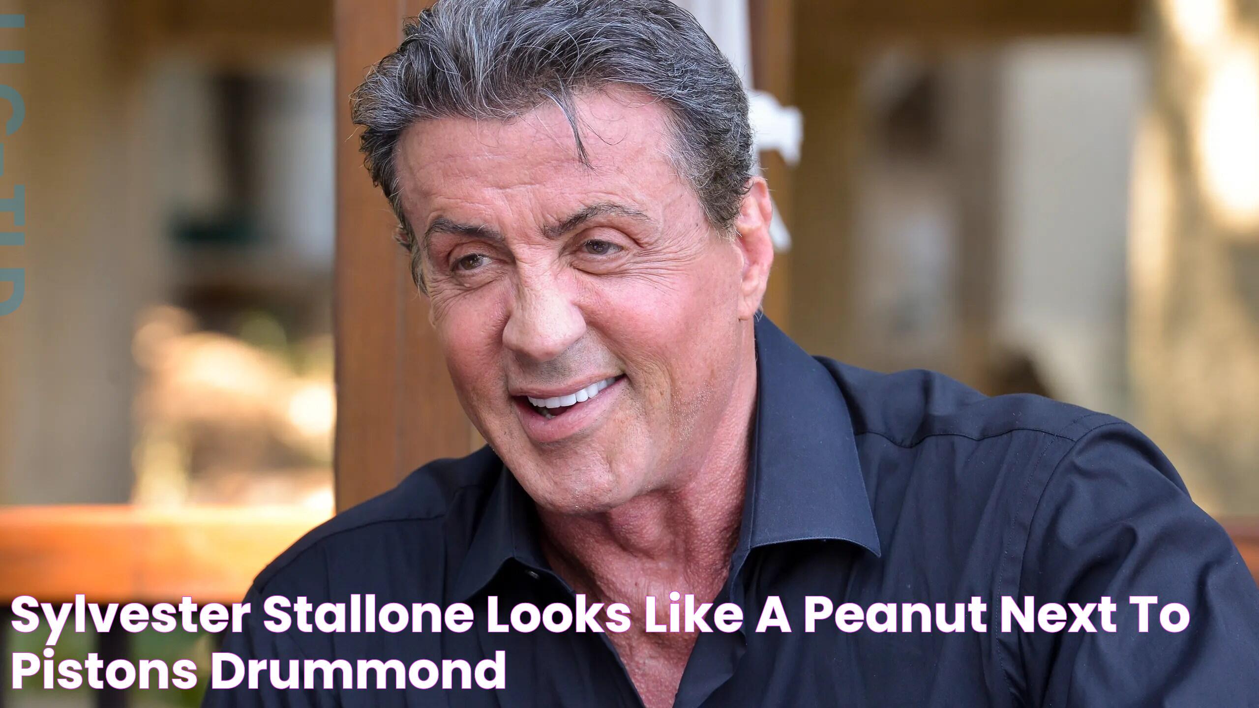 Sylvester Stallone looks like a peanut next to Pistons' Drummond