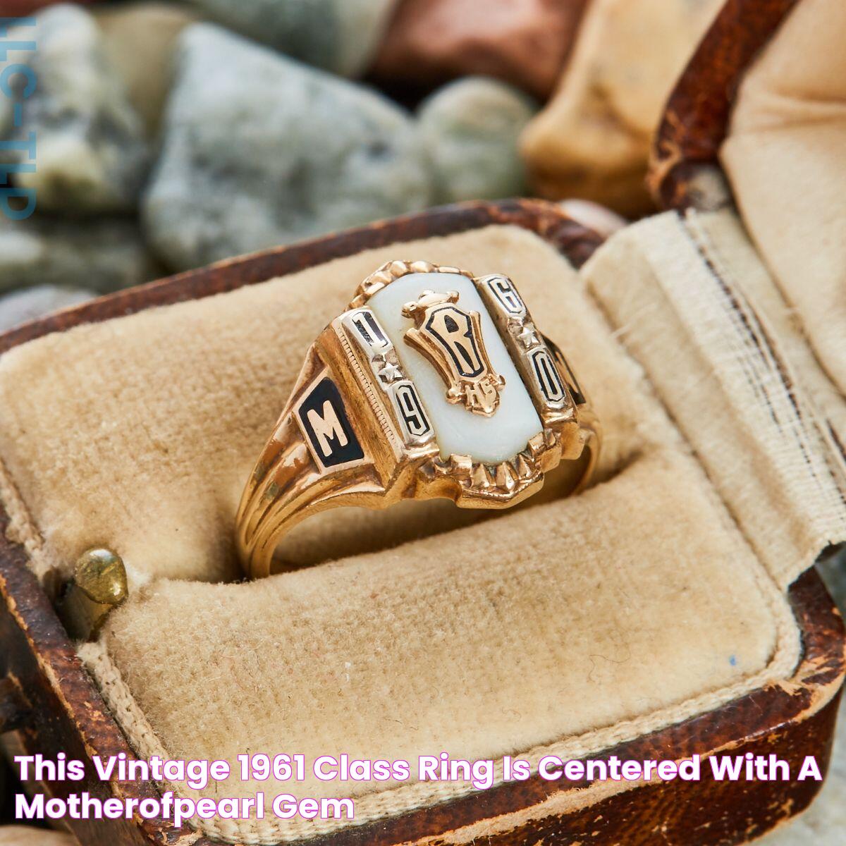 This vintage 1961 class ring is centered with a motherofpearl gem