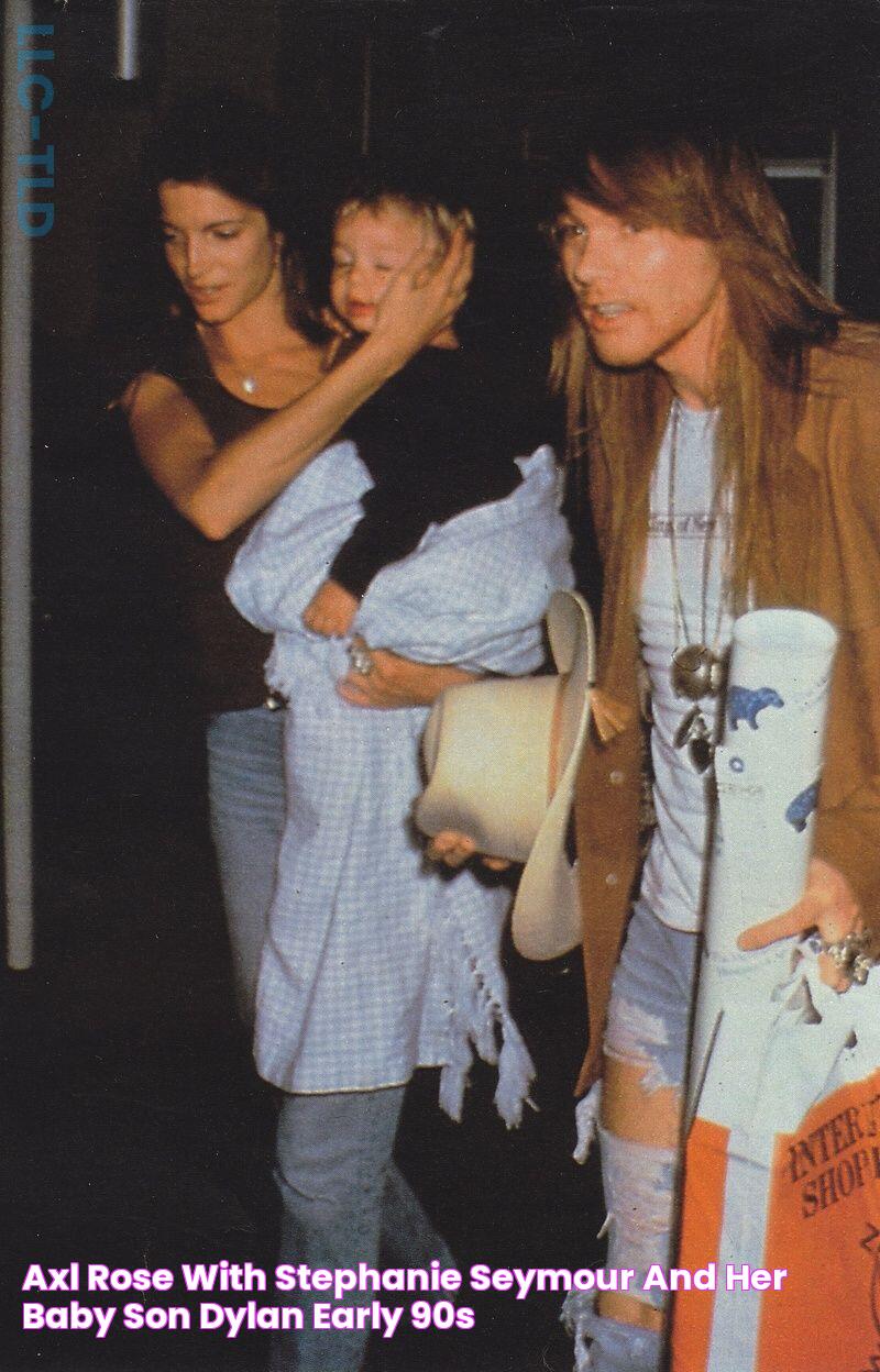 Axl Rose with Stephanie Seymour and her baby son Dylan, early '90s 