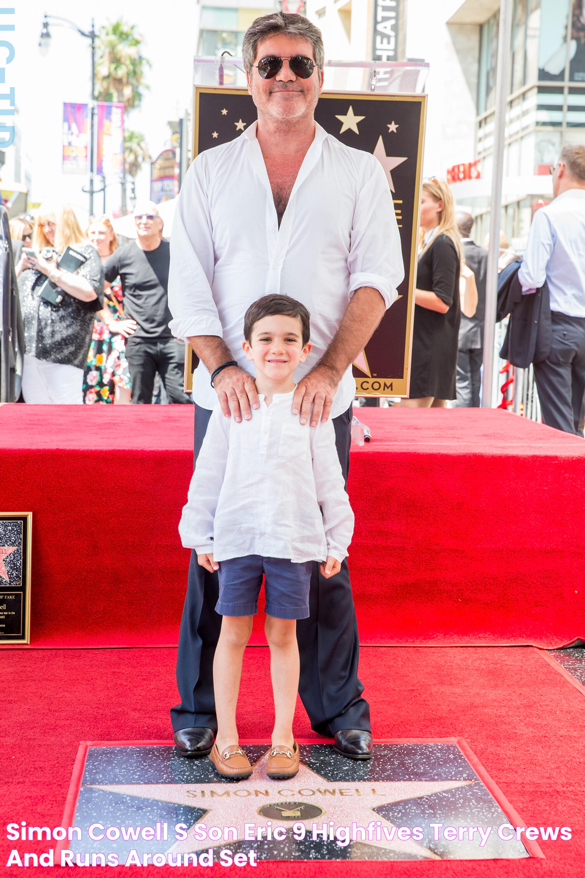 Simon Cowell's son Eric, 9, highfives Terry Crews and runs around set