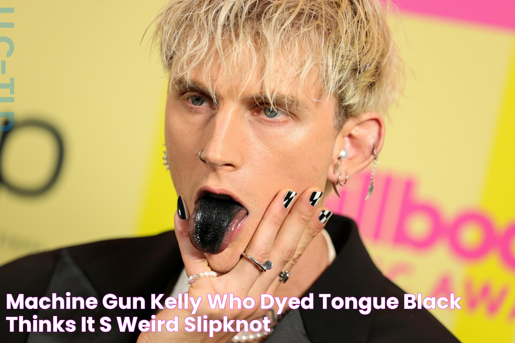 Machine Gun Kelly, Who Dyed Tongue Black, Thinks It’s Weird Slipknot