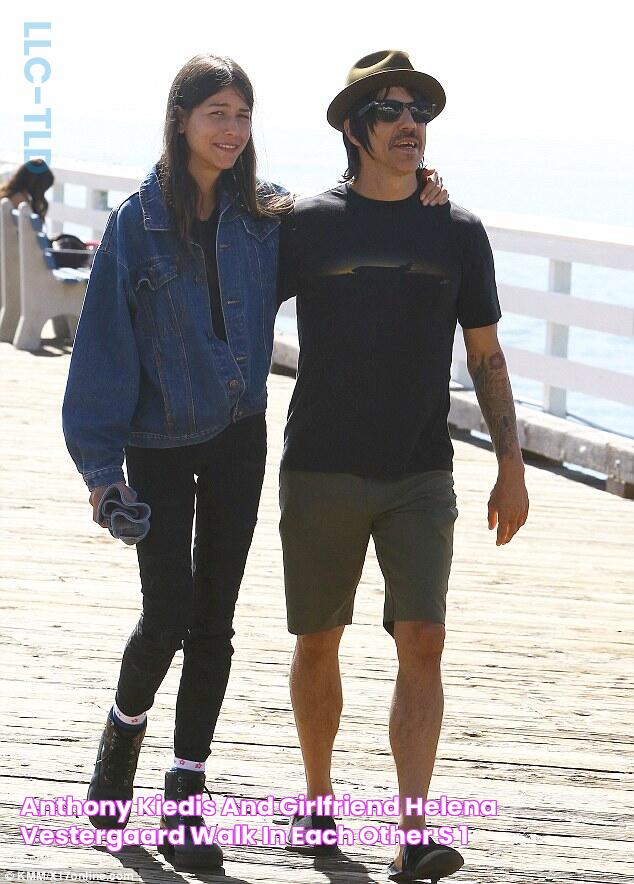 Anthony Kiedis and girlfriend Helena Vestergaard walk in each other's