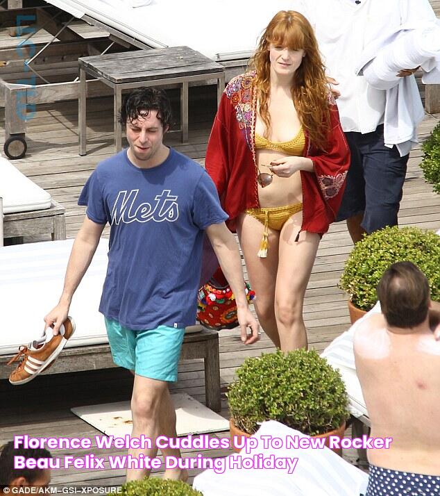 Florence Welch cuddles up to new rocker beau Felix White during holiday