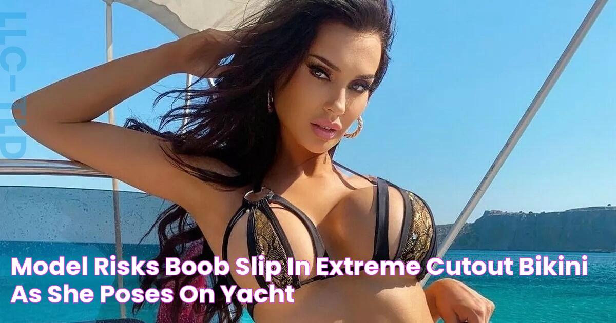 Model risks boob slip in extreme cutout bikini as she poses on yacht