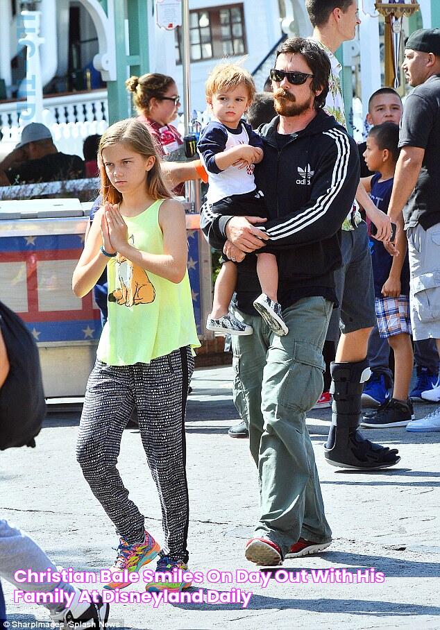 Christian Bale smiles on day out with his family at Disneyland Daily