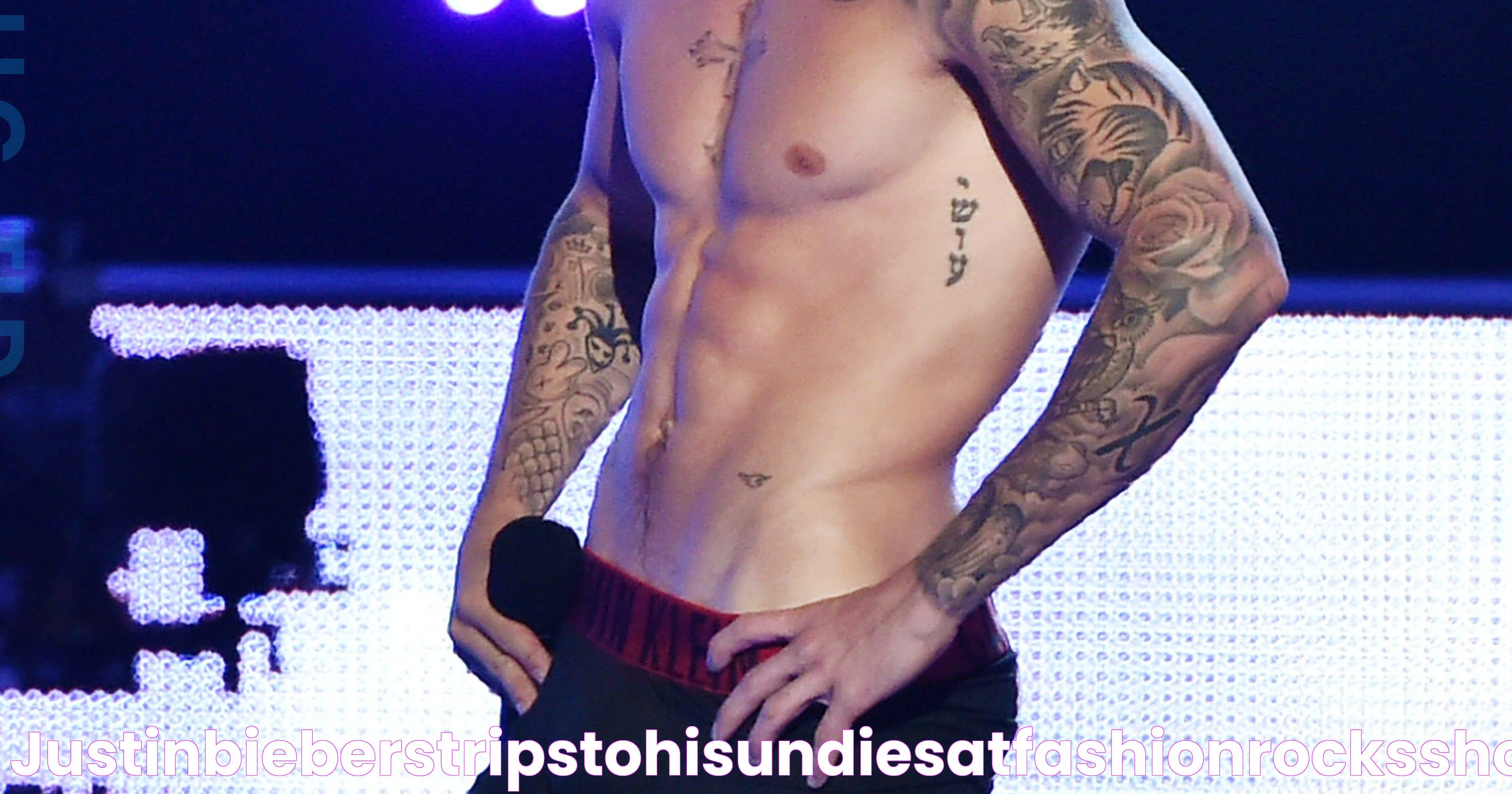 justinbieberstripstohisundiesatfashionrocksshowandgetsbooed