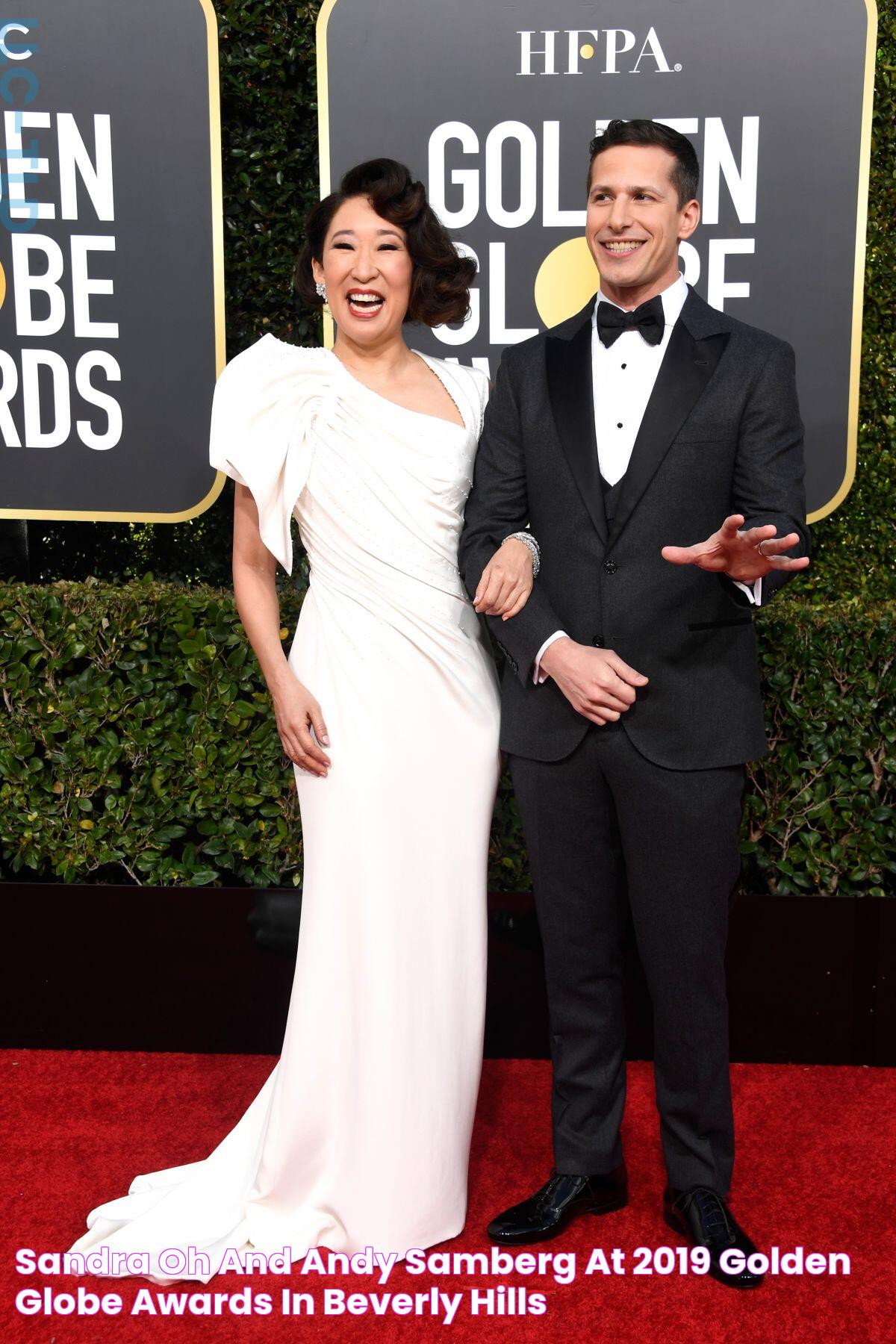 SANDRA OH and Andy Samberg at 2019 Golden Globe Awards in Beverly Hills